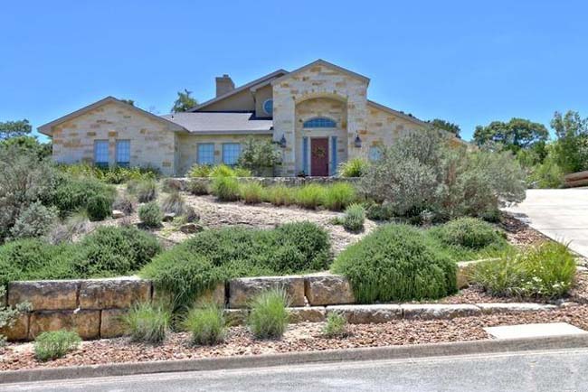 Custom home with panoramic Texas Hill Country views near Kerrville - Riverside Home Designs portfolio