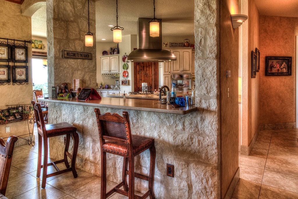 Open beams great room dramatic interior SIP home - Riverside Home Designs Custom Home Portfolio