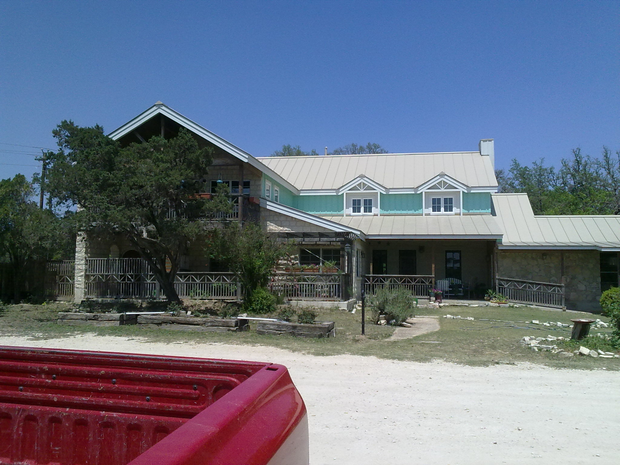 Home Remodel After - completely transformed Hill Country home after full renovation with modern updates - Riverside Home Designs Custom Home Portfolio