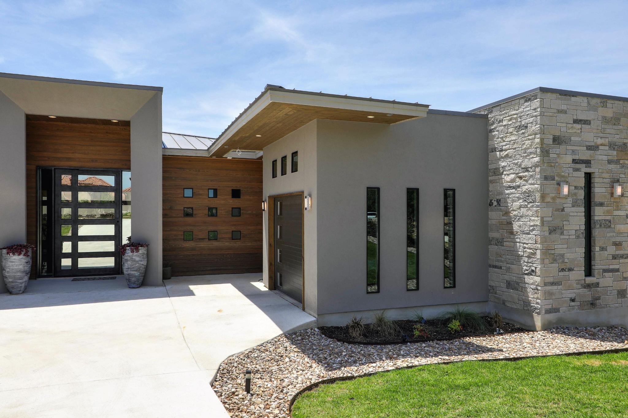 Hill Country Modern Chic - contemporary chic custom home bringing updated style to Hill Country architecture - Riverside Home Designs Custom Home Portfolio