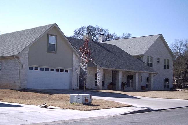 Modern Hill Country Design - contemporary architecture with Hill Country materials and aesthetic - Riverside Home Designs Custom Home Portfolio